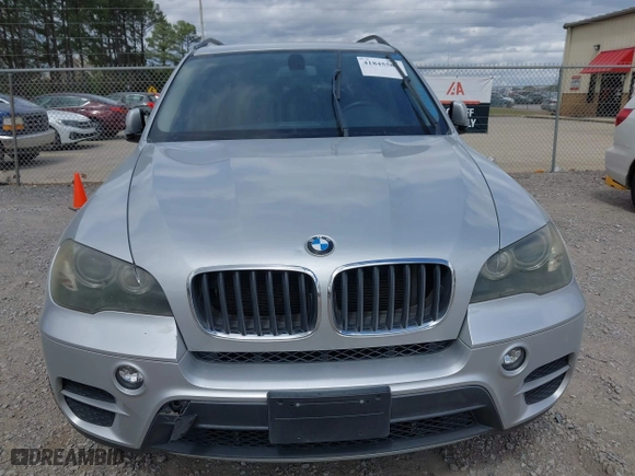 2011 BMW X5 35i with VIN 5UXZV4C52BL742911, listed as a IAAI auction lot 41845588 with 123,001 mi miles. Bid and sale history available at carsss.com. Image 6.
