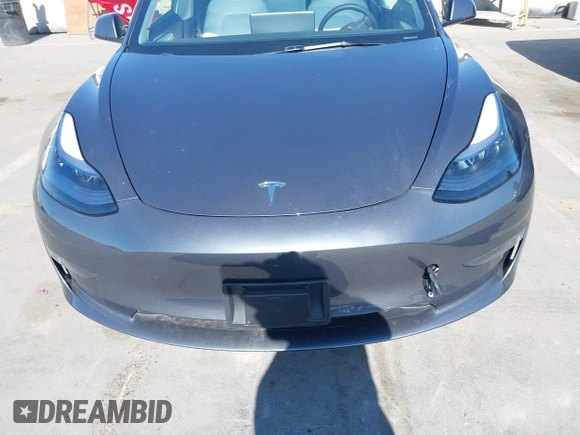 2023 Tesla Model 3 Long Range z VIN 5YJ3E1EB7PF704061, wystawiony jako IAAI lot #42079045 z przebiegiem 4 012 mil mil oraz . Historia ofert i sprzedaży dostępna na DreamBid. Obrazek 12.