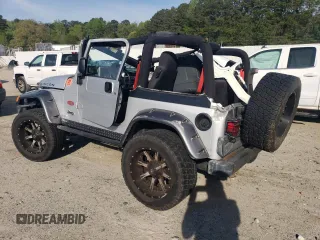 2003 Jeep Wrangler Rubicon z VIN 1J4FA69S53P375189, wystawiony jako Copart lot #54292035 z przebiegiem 55 863 mil mil oraz Szkoda całkowita • Salvage title. Historia ofert i sprzedaży dostępna na DreamBid. Obrazek 2.