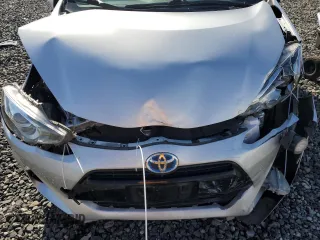 2016 Toyota Prius One z VIN JTDKDTB35G1135081, wystawiony jako Copart lot #49517745 z przebiegiem 69 327 mil mil oraz Szkody całkowita. Historia ofert i sprzedaży dostępna na DreamBid. Obrazek 13.
