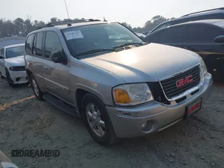 2005 GMC Envoy SLT with VIN 1GKDT13S752251920, listed as a IAAI auction lot 41670725 with 192,509 mi miles. Bid and sale history available at carsss.com. Image 1.