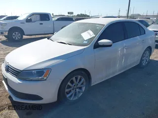 2012 Volkswagen Jetta Sedan SE w/Convenience with VIN 3VWDX7AJ2CM309397, listed as a IAAI auction lot 42020102 with 1 mi miles. Bid and sale history available at carsss.com. Image 2.