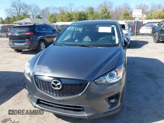 2014 Mazda CX-5 Grand Touring with VIN JM3KE4DY4E0320695, listed as a IAAI auction lot 41989350 with 169,391 mi miles and . Bid and sale history available at DreamBid. Image 13.
