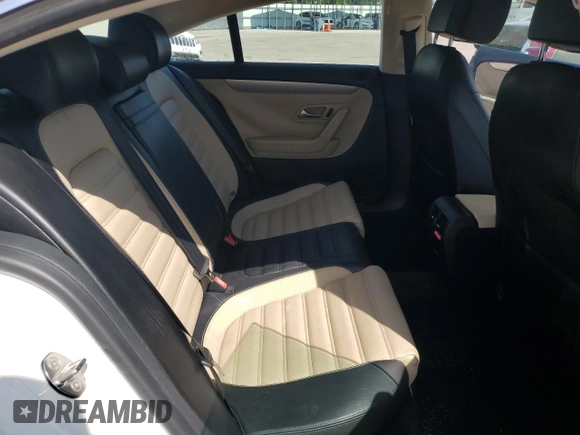 2014 Volkswagen CC Sport with VIN WVWBP7AN8EE538737, listed as a Copart auction lot 68656344 with 131,941 mi miles and Salvage Title. Bid and sale history available at carsss.com. Image 10.