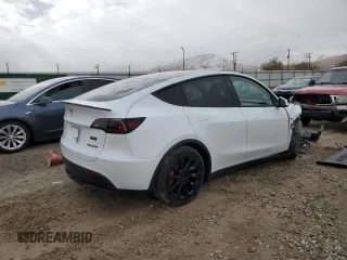 2024 Tesla Model Y Long Range with VIN 7SAYGAEE1RF061318, listed as a Copart auction lot 81142444 with 3,249 mi miles and Salvage Title. Bid and sale history available at DreamBid. Image 3.