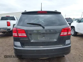 2020 Dodge Journey SE Value z VIN 3C4PDCAB2LT202088, wystawiony jako IAAI lot #41894515 z przebiegiem 97 564 mil mil oraz . Historia ofert i sprzedaży dostępna na DreamBid. Obrazek 16.