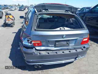 2003 BMW 3 Series 325i with VIN WBAEN33443PC11690, listed as a IAAI auction lot 41939082 with 159,123 mi miles. Bid and sale history available at carsss.com. Image 6.