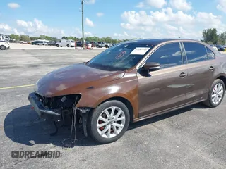 2011 Volkswagen Jetta SE with VIN 3VWDZ7AJ3BM396168, listed as a IAAI auction lot 41682745 with 127,052 mi miles and . Bid and sale history available at DreamBid. Image 2.
