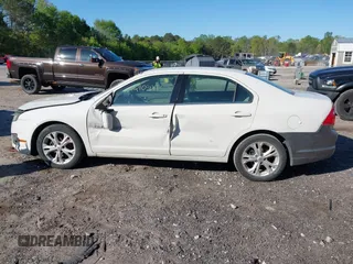 2012 Ford Fusion SE with VIN 3FAHP0HA9CR402640, listed as a IAAI auction lot 42052610 with 210,441 mi miles and . Bid and sale history available at carsss.com. Image 14.