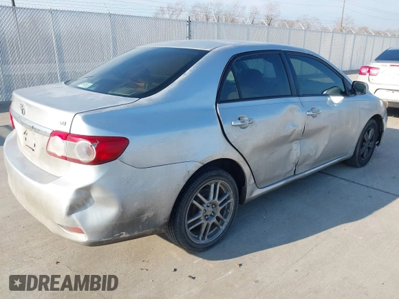 2011 Toyota Corolla L with VIN JTDBU4EE0BJ102517, listed as a IAAI auction lot 41702532 with 296,646 mi miles. Bid and sale history available at carsss.com. Image 4.