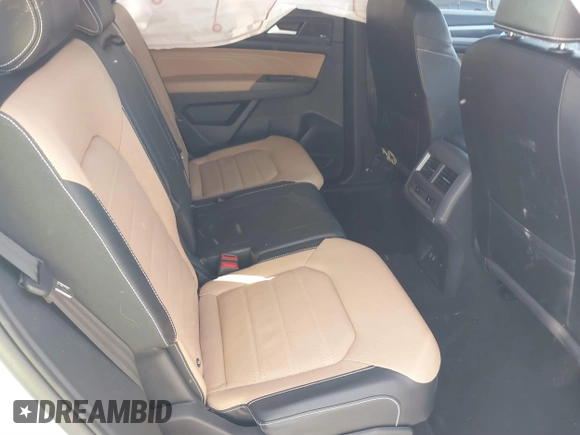 2022 Volkswagen Atlas SEL Premium R-Line with VIN 1V2FE2CA6NC220596, listed as a IAAI auction lot 41864407 with 13,120 mi miles and . Bid and sale history available at DreamBid. Image 8.
