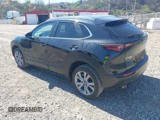 2023 Mazda CX-30 S Carbon Edition with VIN 3MVDMBCM1PM509987, listed as a IAAI auction lot 42060833 with 14,140 mi miles and . Bid and sale history available at DreamBid. Image 3.