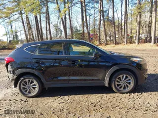 2018 Hyundai Tucson SE with VIN KM8J23A48JU708357, listed as a IAAI auction lot 41274856 with 66,531 mi miles. Bid and sale history available at carsss.com. Image 14.