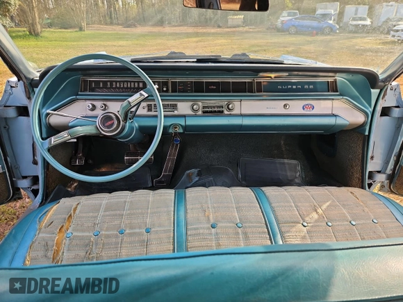 1964 Oldsmobile 88 z VIN 854M274413, wystawiony jako Copart lot #48237445 z przebiegiem 45 480 mil mil oraz Tytuł czysty. Historia ofert i sprzedaży dostępna na DreamBid. Obrazek 9.