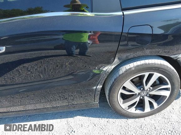 2021 Honda Odyssey Touring with VIN 5FNRL6H84MB027396, listed as a IAAI auction lot 42616650 with 67,207 mi miles and . Bid and sale history available at DreamBid. Image 17.