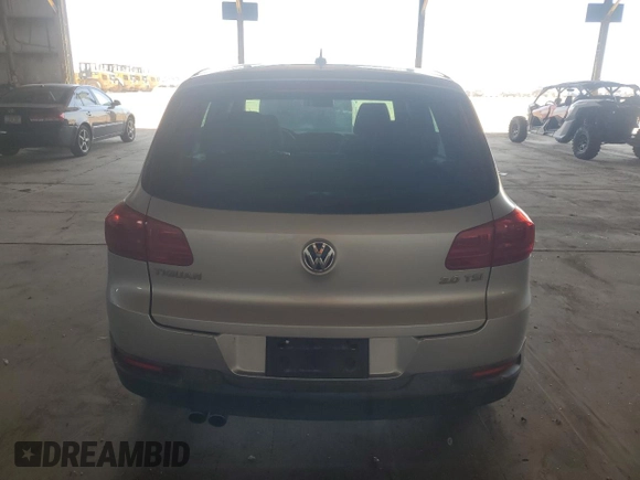 2013 Volkswagen Tiguan S with VIN WVGAV3AX8DW576243, listed as a Copart auction lot 62882635 with 115,113 mi miles and Clean title. Bid and sale history available at DreamBid. Image 6.