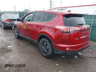 2018 Toyota RAV4 LE with VIN 2T3BFREV4JW850078, listed as a IAAI auction lot 42360903 with 81,591 mi miles and . Bid and sale history available at DreamBid. Image 3.