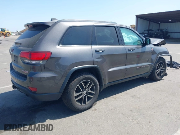 2017 Jeep Grand Cherokee Trailhawk with VIN 1C4RJFLG7HC654259, listed as a IAAI auction lot 42510197 with 103,947 mi miles and . Bid and sale history available at DreamBid. Image 4.
