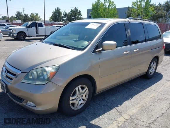 2006 Honda Odyssey EX-L with VIN 5FNRL38646B044795, listed as a IAAI auction lot 42102422 with 213,194 mi miles and . Bid and sale history available at carsss.com. Image 2.