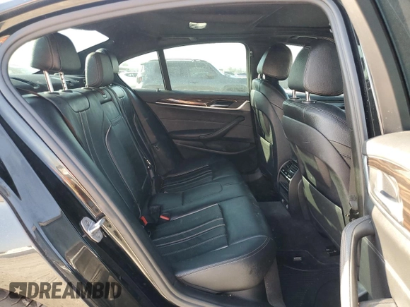 2018 BMW 5 Series 530i with VIN WBAJA5C54JG899845, listed as a Copart auction lot 76386124 with 57,379 mi miles and Salvage Title. Bid and sale history available at DreamBid. Image 10.