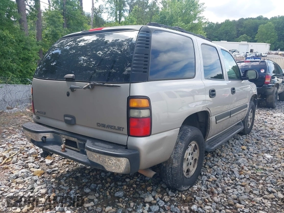 2005 Chevrolet Tahoe LS with VIN 1GNEC13V55R235594, listed as a IAAI auction lot 42245180 with 312,669 mi miles and . Bid and sale history available at DreamBid. Image 4.