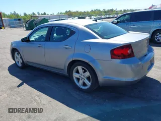 2013 Dodge Avenger with VIN 1C3CDZAB4DN661517, listed as a IAAI auction lot 41886529 with 141,596 mi miles and . Bid and sale history available at DreamBid. Image 3.