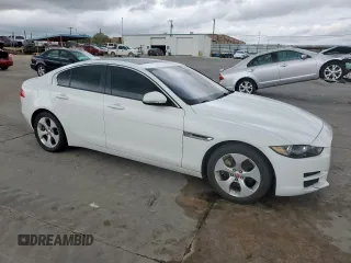 2018 Jaguar XE 25t with VIN SAJAR4FX4JCP31280, listed as a Copart auction lot 50580375 with 125,060 mi miles and Salvage Title. Bid and sale history available at DreamBid. Image 4.