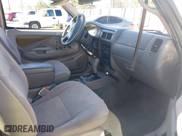 2001 Toyota Tacoma PreRunner z VIN 5TEGN92N51Z804874, wystawiony jako IAAI lot #41861876 z przebiegiem 201 333 mil mil oraz . Historia ofert i sprzedaży dostępna na DreamBid. Obrazek 5.