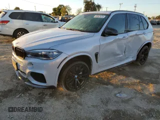 2017 BMW X5 xDrive50i with VIN 5UXKR6C56H0J84136, listed as a Copart auction lot 80987874 with 114,620 mi miles and Salvage title. Bid and sale history available at DreamBid. Image 1.