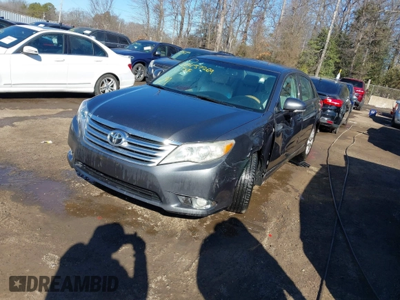 2011 Toyota Avalon with VIN 4T1BK3DB1BU416470, listed as a IAAI auction lot 41437269 with 201,775 mi miles and . Bid and sale history available at DreamBid. Image 2.