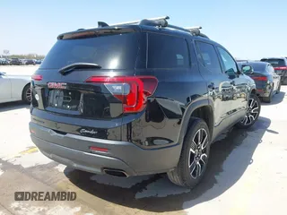 2021 GMC Acadia SLT with VIN 1GKKNMLS7MZ204928, listed as a IAAI auction lot 41719245 with 76,825 mi miles. Bid and sale history available at carsss.com. Image 4.