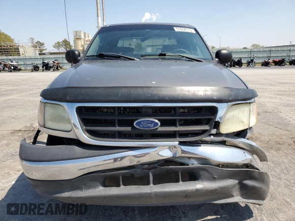 2003 Ford F-150 XLT with VIN 1FTRW07663KA63497, listed as a Copart auction lot 51658115 with 269,633 mi miles and Salvage Title. Bid and sale history available at carsss.com. Image 5.
