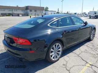 2013 Audi A7 Premium Plus with VIN WAUYGAFCXDN132677, listed as a IAAI auction lot 42630446 with 132,398 mi miles and . Bid and sale history available at DreamBid. Image 4.