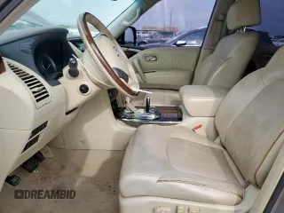 2014 Infiniti QX80 z VIN JN8AZ2NFXE9554446, wystawiony jako Copart lot #59659885 z przebiegiem 240 055 mil mil oraz Czysty tytuł • Clean title. Historia ofert i sprzedaży dostępna na DreamBid. Obrazek 7.