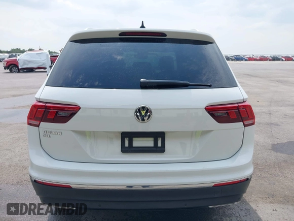 2020 Volkswagen Tiguan SE z VIN 3VV3B7AX4LM032609, wystawiony jako IAAI lot #42074359 z przebiegiem 52 404 mil mil oraz . Historia ofert i sprzedaży dostępna na DreamBid. Obrazek 16.