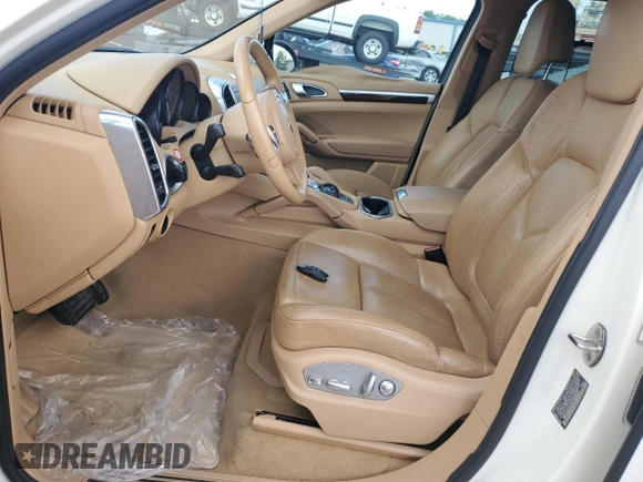 2012 Porsche Cayenne with VIN WP1AA2A23CLA02615, listed as a Copart auction lot 64604655 with 131,536 mi miles and Salvage title. Bid and sale history available at DreamBid. Image 7.