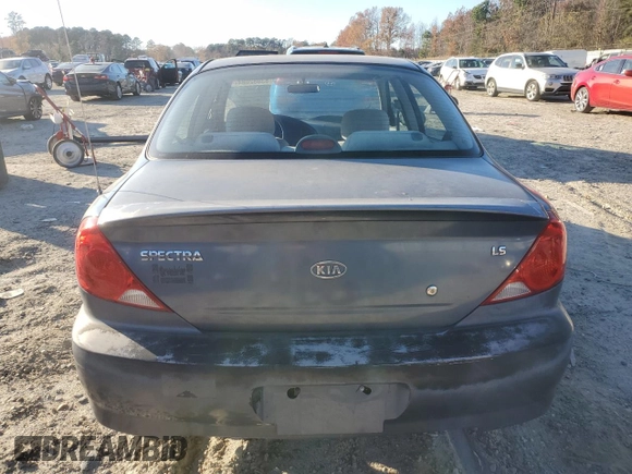 2004 Kia Spectra z VIN KNAFB121045315435, wystawiony jako Copart lot #83082084 z przebiegiem 94 974 mil mil oraz Czysty tytuł • Clean title. Historia ofert i sprzedaży dostępna na DreamBid. Obrazek 6.