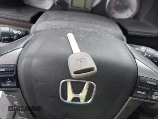 2012 Honda Pilot EX-L with VIN 5FNYF4H5XCB051133, listed as a IAAI auction lot 41907624 with 202,244 mi miles and . Bid and sale history available at carsss.com. Image 11.