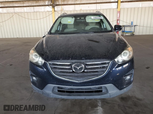 2016 Mazda CX-5 Touring with VIN JM3KE2CY7G0653854, listed as a Copart auction lot 74825564 with 139,193 mi miles and Salvage Title. Bid and sale history available at DreamBid. Image 5.