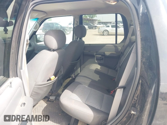 2005 Ford Explorer Sport Trac XLS z VIN 1FMZU67K25UB46224, wystawiony jako IAAI lot #42637796 z przebiegiem 164 944 mil mil oraz . Historia ofert i sprzedaży dostępna na DreamBid. Obrazek 8.
