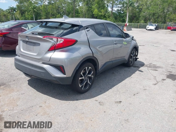 2019 Toyota C-HR XLE with VIN NMTKHMBX8KR093044, listed as a IAAI auction lot 41939036 with 60,130 mi miles. Bid and sale history available at carsss.com. Image 4.