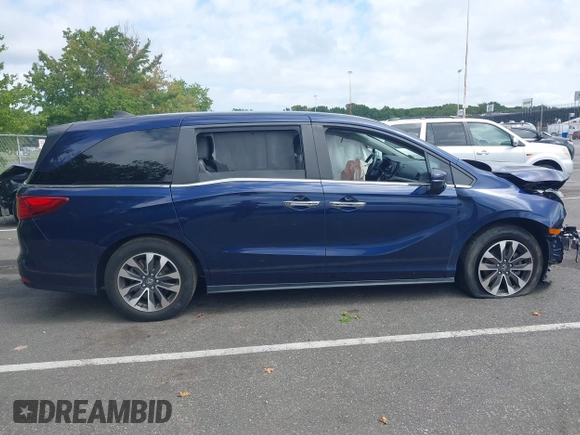 2022 Honda Odyssey EX-L with VIN 5FNRL6H70NB053843, listed as a IAAI auction lot 40210685 with 21,571 mi miles and . Bid and sale history available at DreamBid. Image 14.
