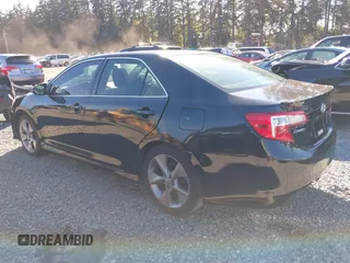 2014 Toyota Camry L with VIN 4T1BF1FK0EU732209, listed as a IAAI auction lot 40424721 with 200,271 mi miles. Bid and sale history available at carsss.com. Image 3.