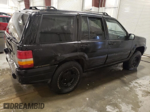 1997 Jeep Grand Cherokee Laredo с VIN 1J4GZ58S3VC508180, выставлен на аукционе Copart как лот 54856525 с пробегом 214 845 миль миль и На запчасти • Non repairable. История ставок и продаж доступна на DreamBid. Изображение 3.