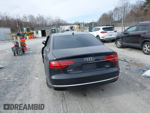 2015 Audi A8 L 4.0T with VIN WAU32AFD7FN006233, listed as a IAAI auction lot 41353034 with 119,693 mi miles. Bid and sale history available at carsss.com. Image 16.