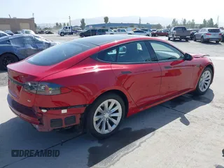 2016 Tesla Model S 70 with VIN 5YJSA1E17GF152401, listed as a IAAI auction lot 42272384 with 65,698 mi miles and . Bid and sale history available at DreamBid. Image 4.