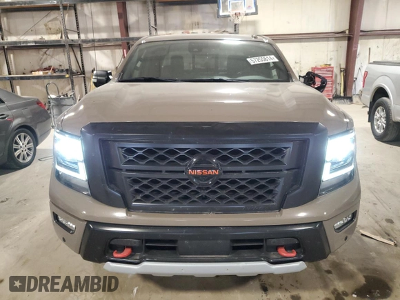 2020 Nissan Titan SL с VIN 1N6AA1EDXLN503963, выставлен на аукционе Copart как лот 56694005 с пробегом 61 341 миль миль и Списание • Salvage title. История ставок и продаж доступна на DreamBid. Изображение 5.