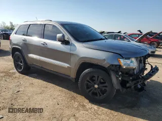 2011 Jeep Grand Cherokee Laredo with VIN 1J4RR4GGXBC642759, listed as a Copart auction lot 55767575 with 144,104 mi miles and Salvage title. Bid and sale history available at DreamBid. Image 4.