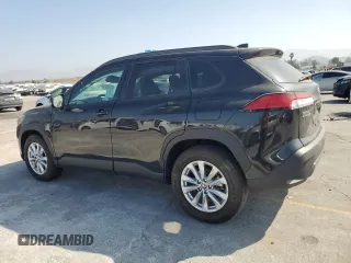 2023 Toyota Corolla Cross LE with VIN 7MUCAABG1PV050123, listed as a Copart auction lot 61384845 with 30,712 mi miles and Salvage title. Bid and sale history available at DreamBid. Image 2.