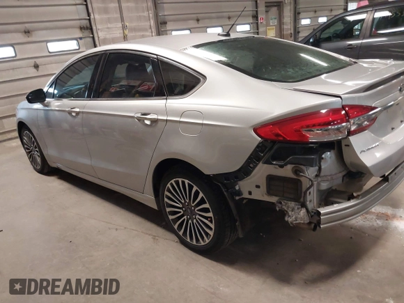 2018 Ford Fusion Titanium with VIN 3FA6P0D91JR138698, listed as a IAAI auction lot 41992522 with 95,017 mi miles and . Bid and sale history available at DreamBid. Image 3.